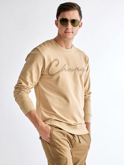 Cream Solid Sweatshirt