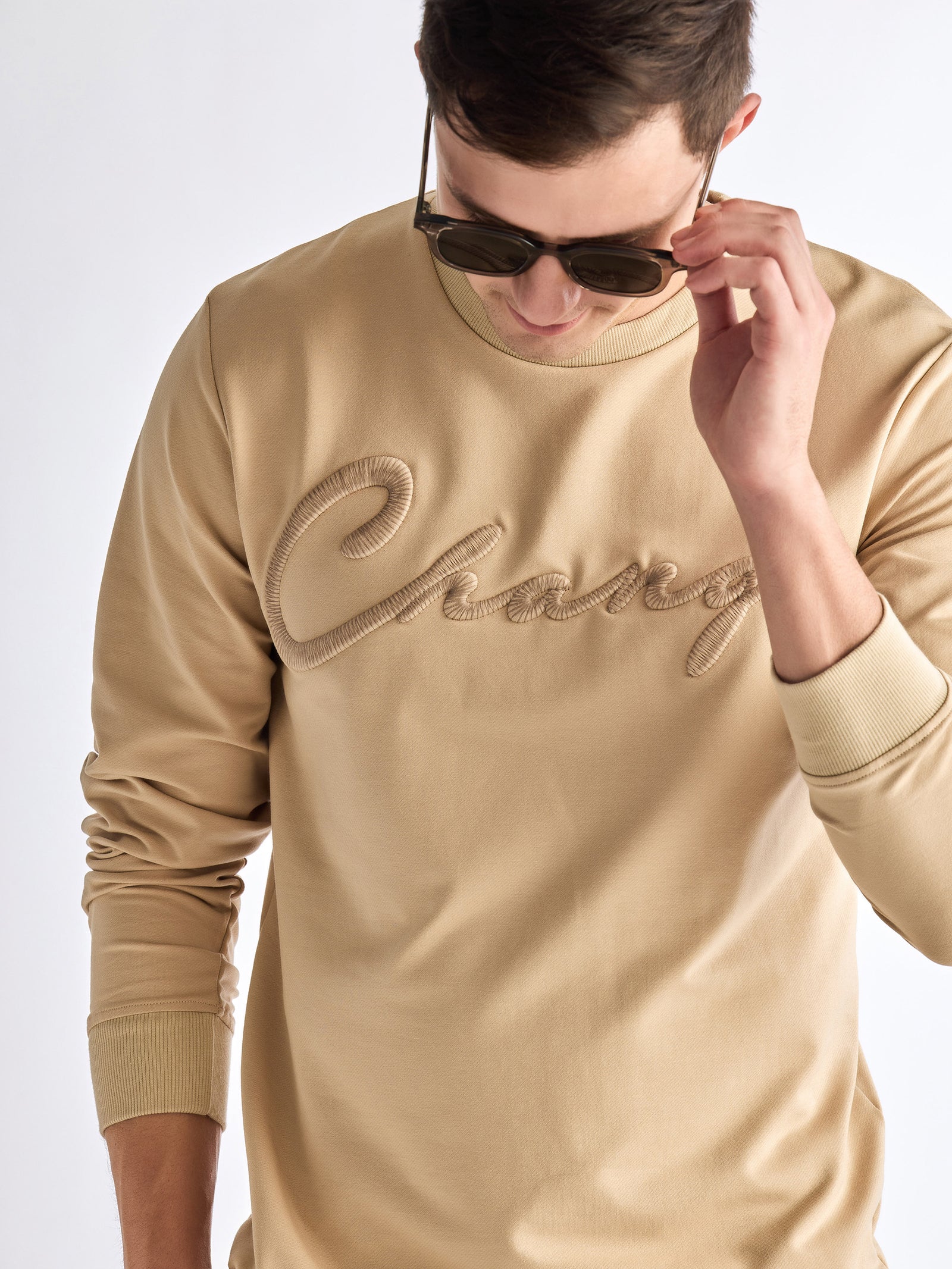 Cream Solid Sweatshirt